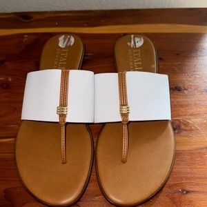 Like new Italian Shoemakers. White /tan elastic fit. Size 8